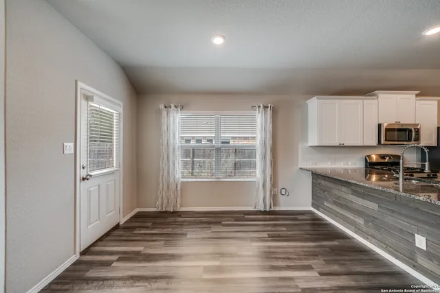 a view of a kitchen with electric equipment