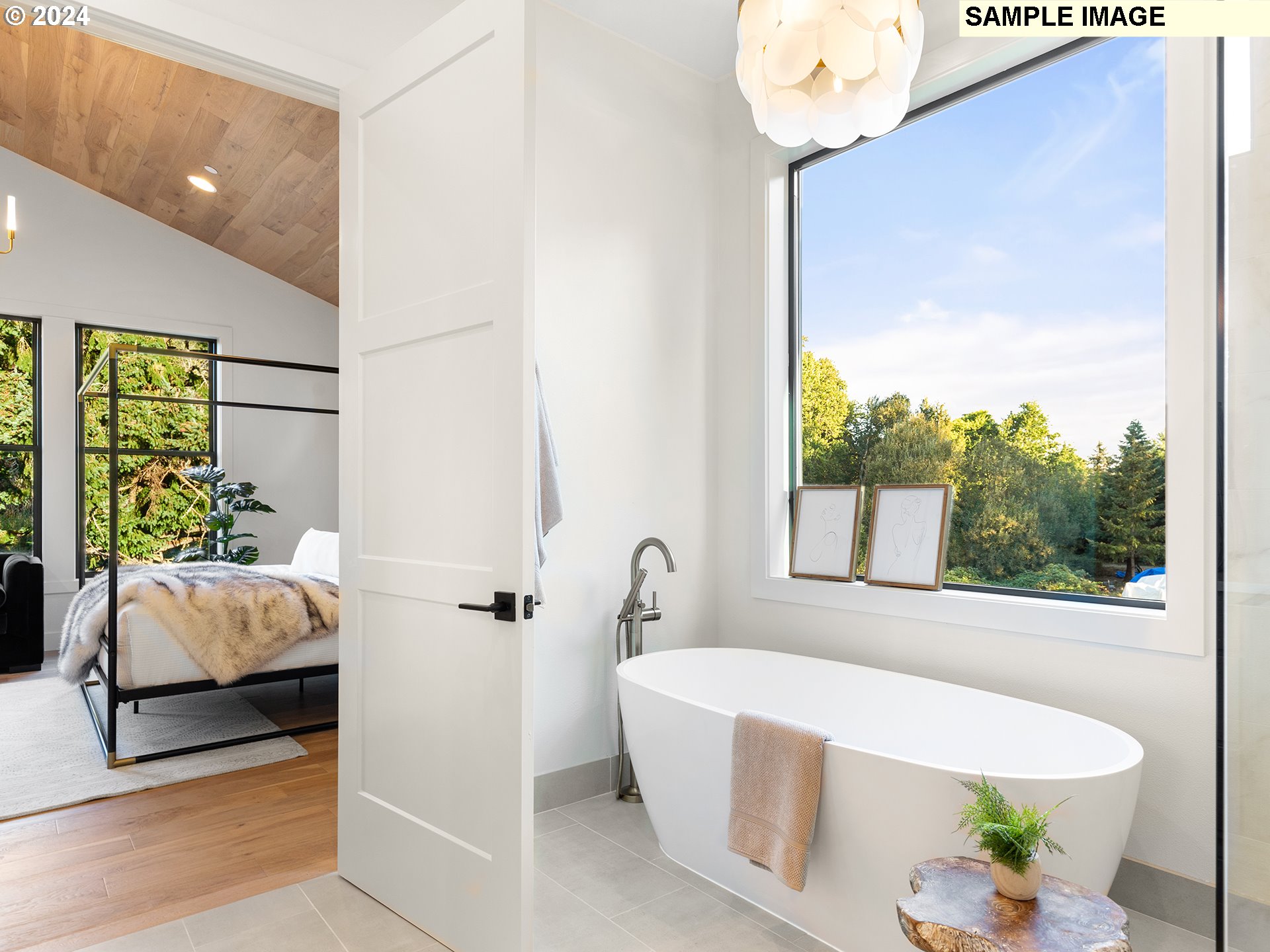 17207 Northwest 7th Avenue Ridgefield, WA 98642 - Photo 13 of 16 a bathroom with a tub and a large window