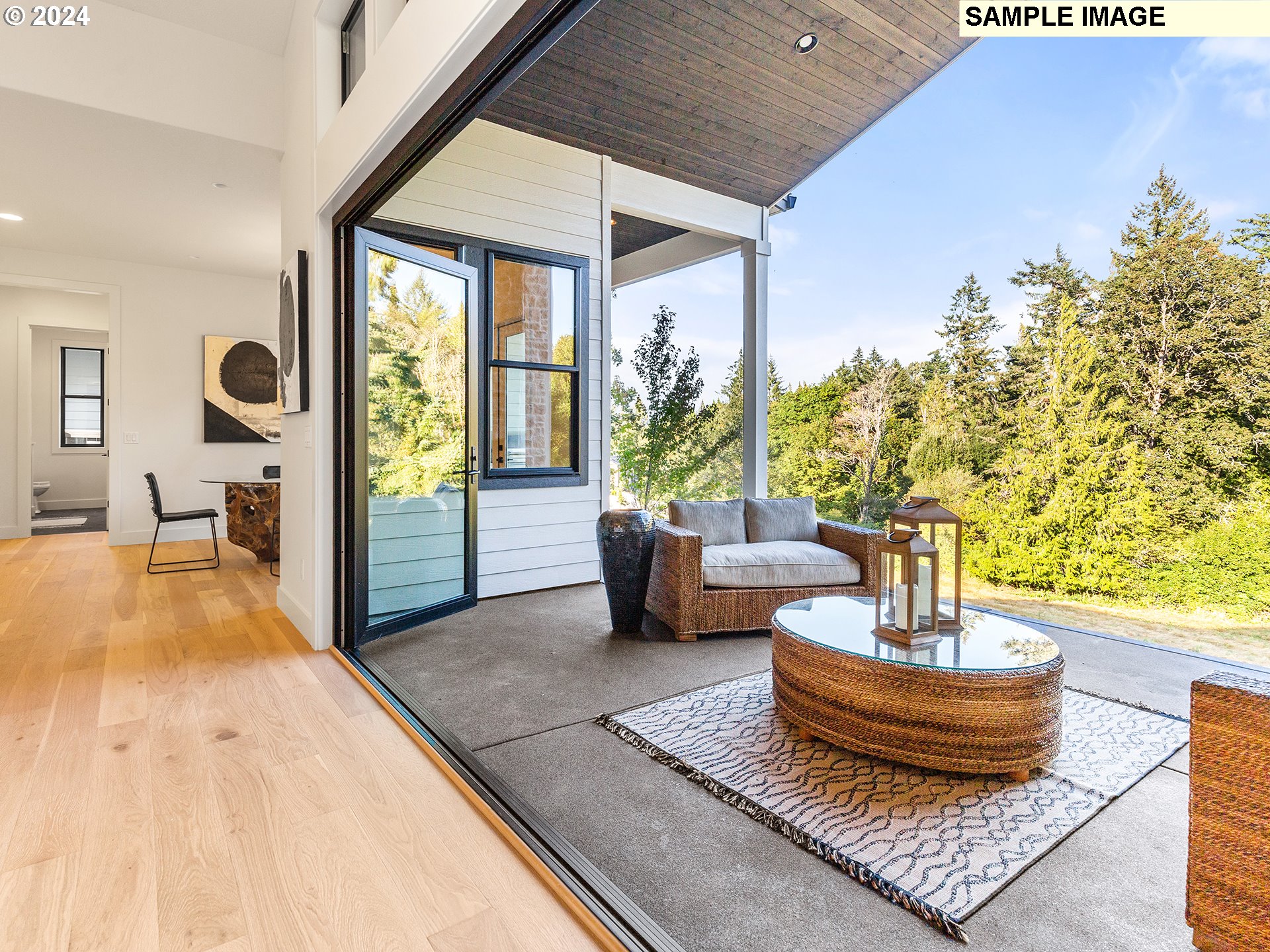 17207 Northwest 7th Avenue Ridgefield, WA 98642 - Photo 6 of 16 a living room with furniture and a potted plant