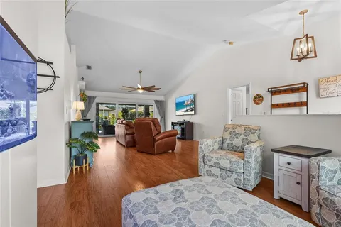 a kitchen with cabinets stainless steel appliances a sink and a stove