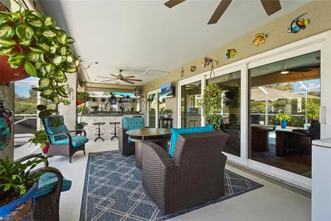 a view of swimming pool with a patio