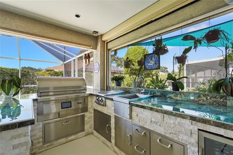 a dining room with furniture and garden view