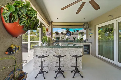 a view of a house with a potted plant