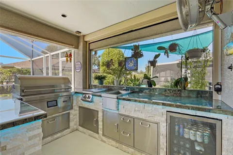 a view of a backyard with sitting area