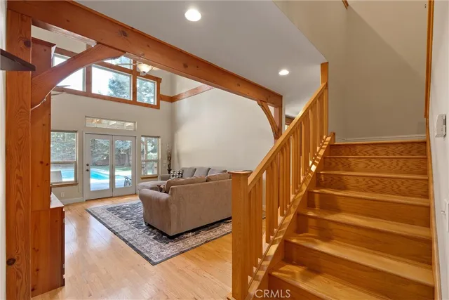 a living room with furniture and a rug