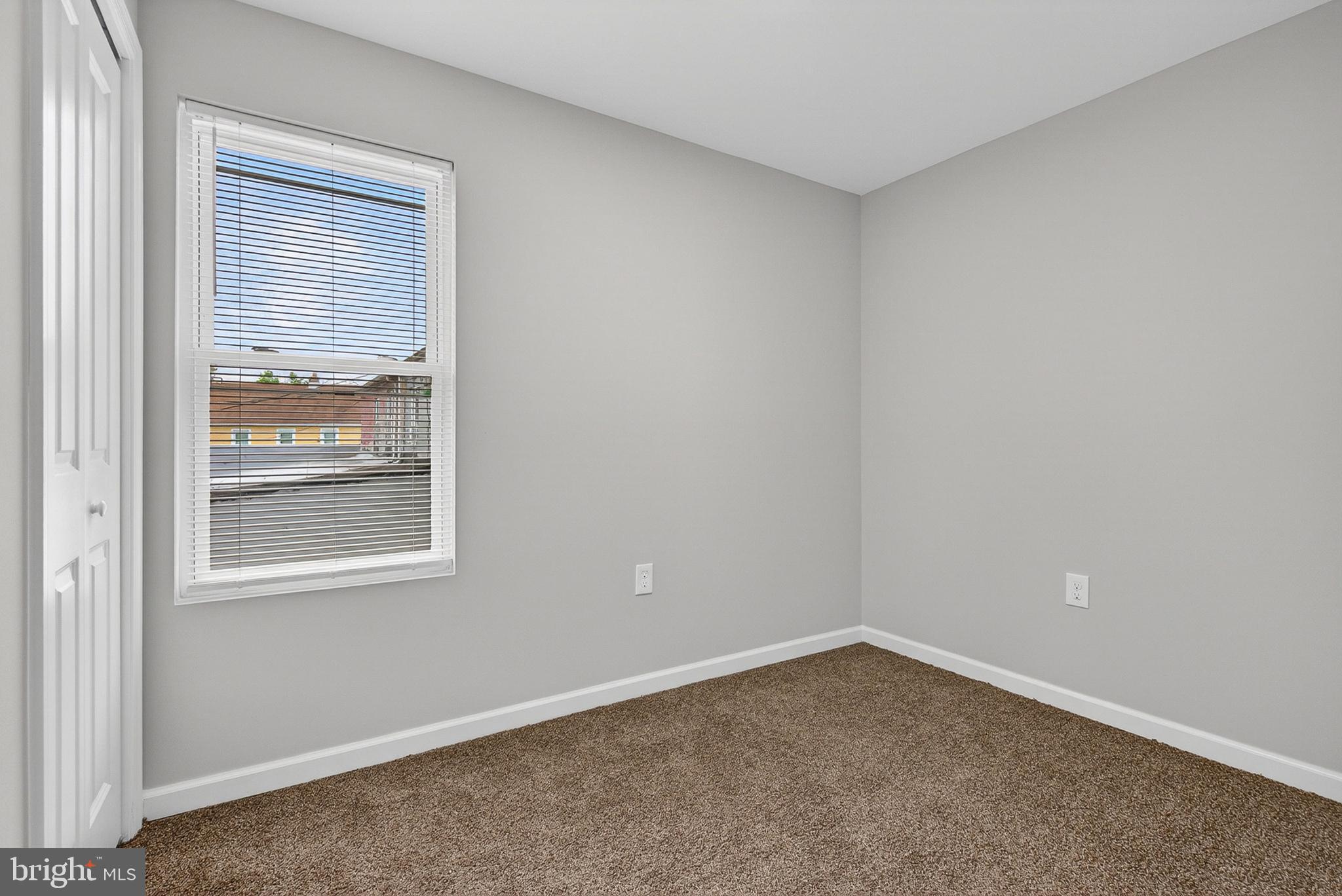 3708 Old Frederick Road Baltimore, MD 21229 - Photo 19 of 26 an empty room with a window