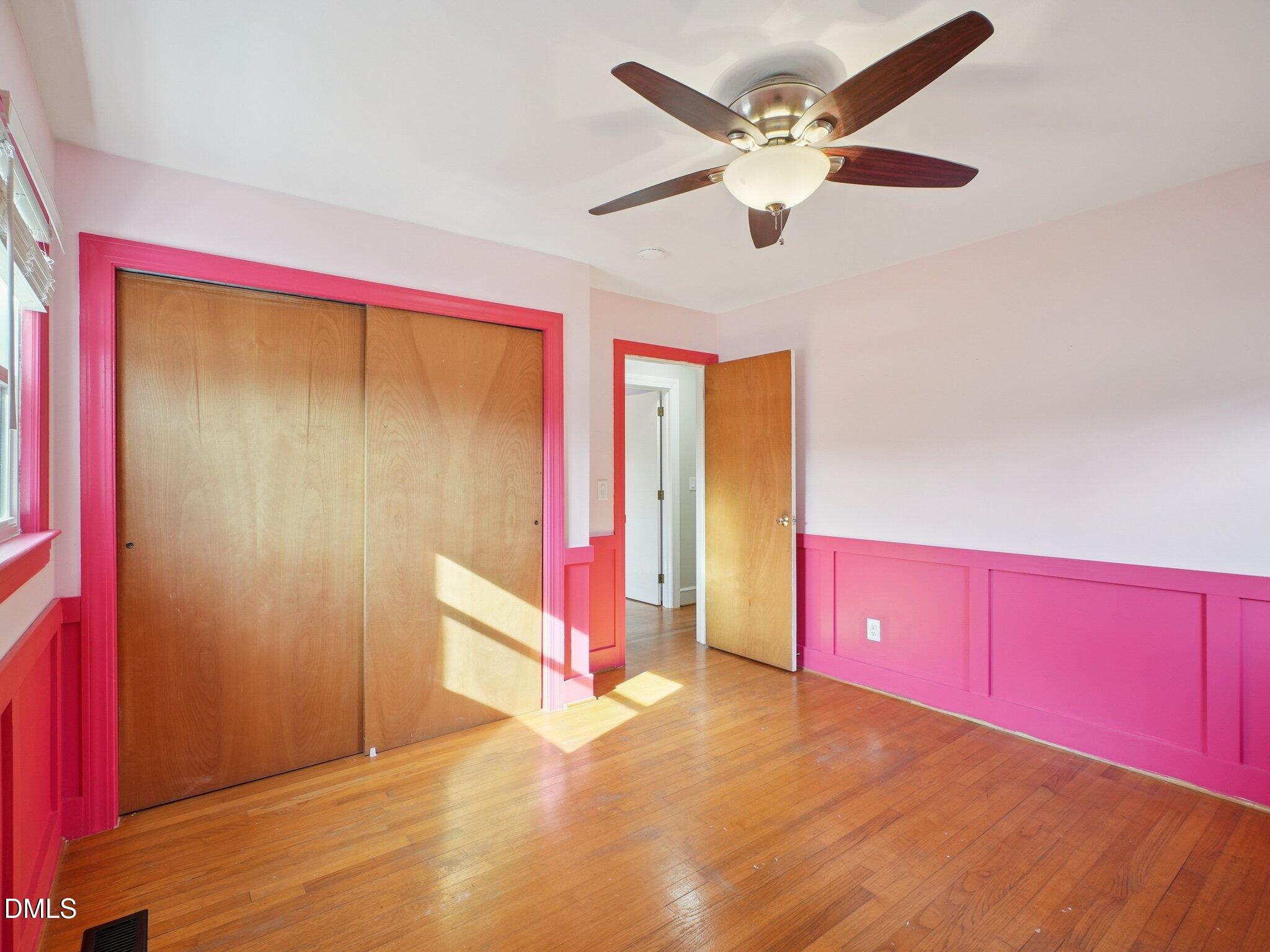 5474 Deans Road Battleboro, NC 27809 - Photo 17 of 32 an empty room with closet and ceiling fan
