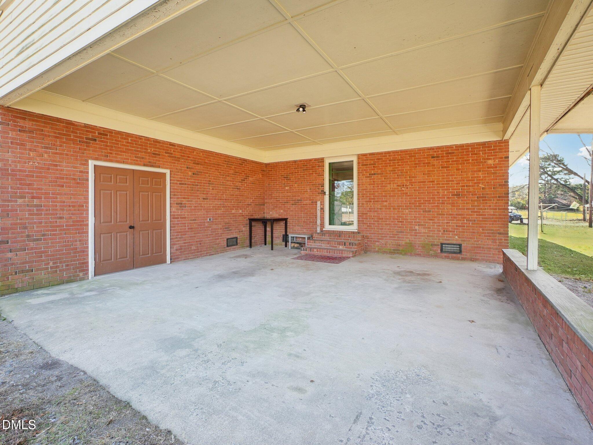 5474 Deans Road Battleboro, NC 27809 - Photo 22 of 32 a view of empty room with a window