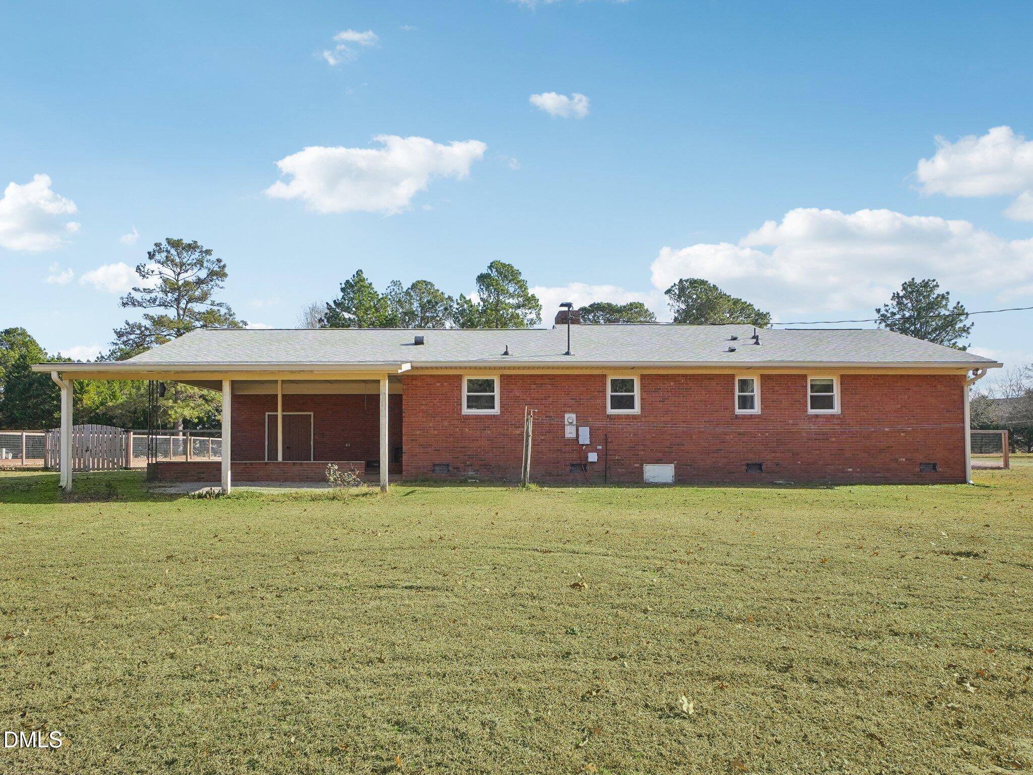 5474 Deans Road Battleboro, NC 27809 - Photo 23 of 32 a view of a house with a yard