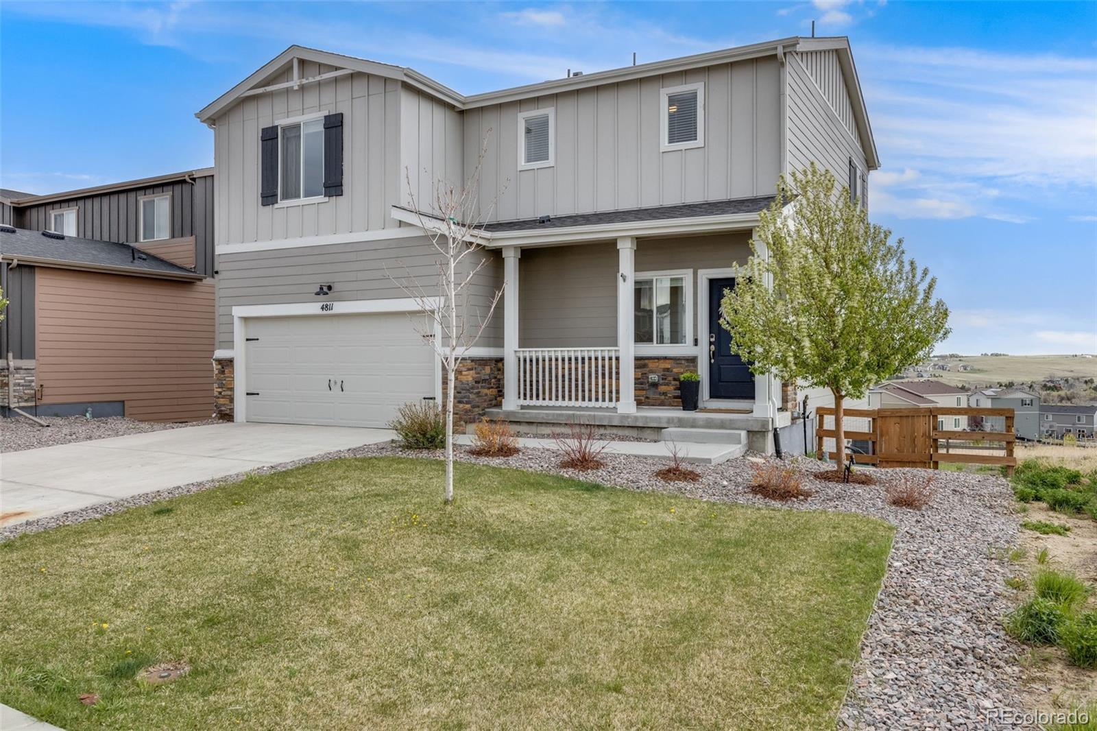 4811 River Highlands Loop Elizabeth, CO 80107 - Photo 2 of 37 a house view with a outdoor space