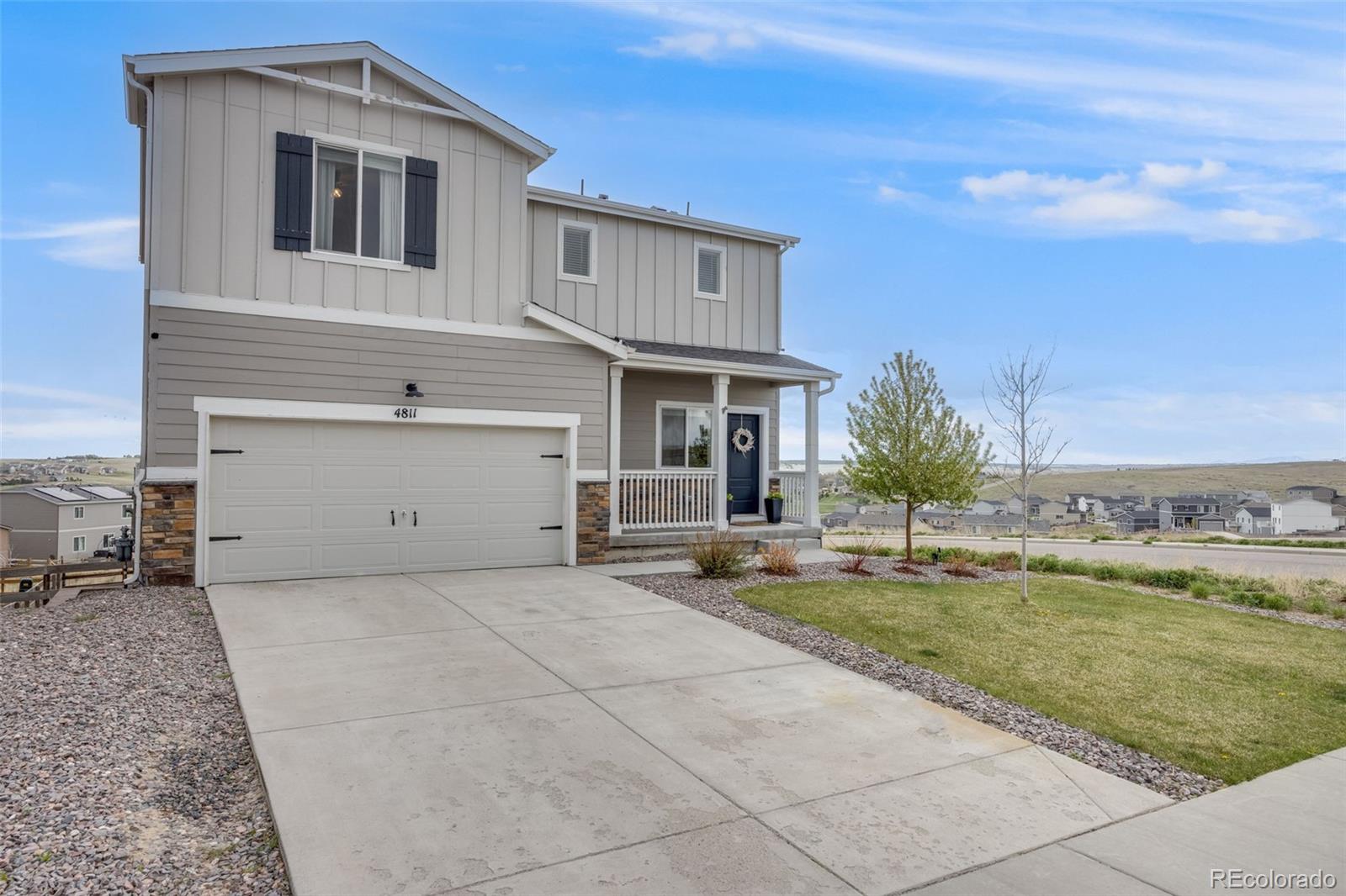 4811 River Highlands Loop Elizabeth, CO 80107 - Photo 4 of 37 a house view with a outdoor space