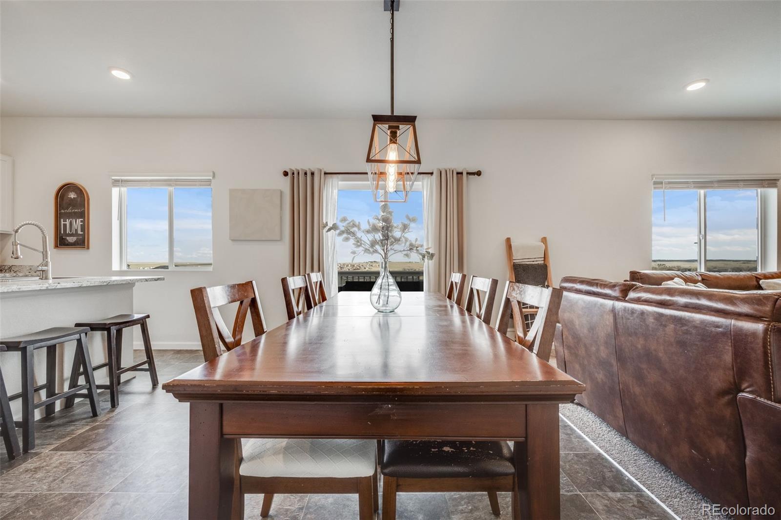4811 River Highlands Loop Elizabeth, CO 80107 - Photo 9 of 37 a view of a dining room with furniture