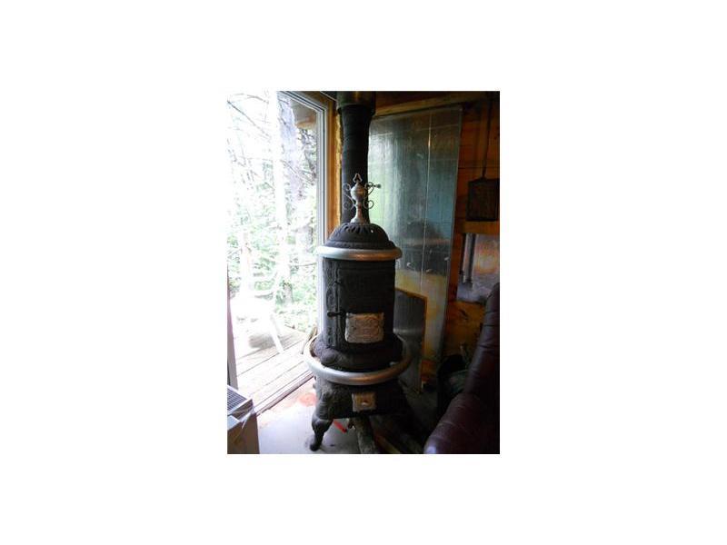 1027 Rockland Road Somerville, ME 04348 - Photo 7 of 25 Other. Antique Wood stove in sun...