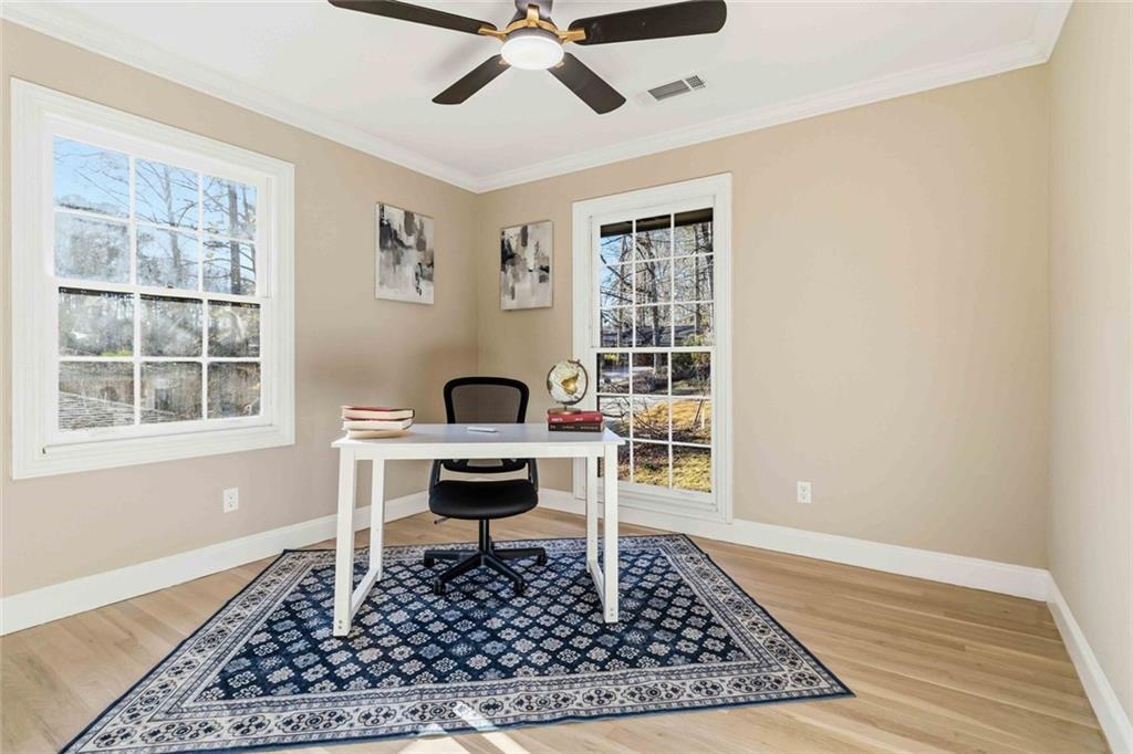 2927 Ponderosa Circle Decatur, GA 30033 - Photo 12 of 27 a work room with a window and a rug
