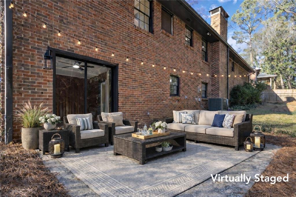 2927 Ponderosa Circle Decatur, GA 30033 - Photo 24 of 27 a outdoor living space with furniture and a potted plant