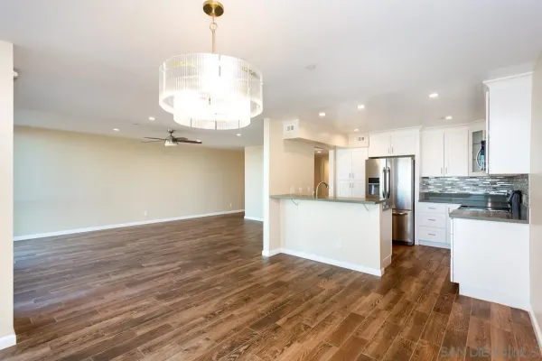 a view of kitchen with wooden floor