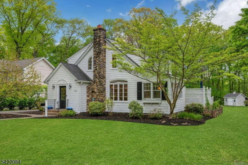 122 Kenilworth Road Mountain Lakes, NJ 07046 - Photo 2 of 45 a front view of house with yard and green space
