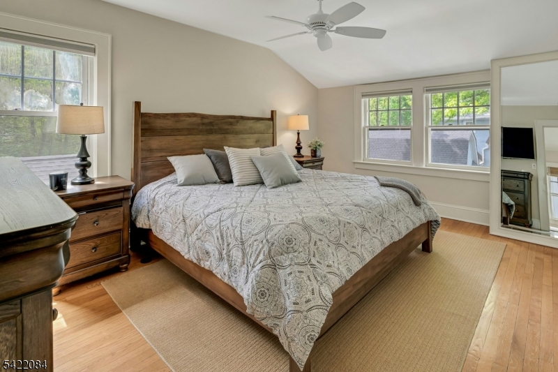 122 Kenilworth Road Mountain Lakes, NJ 07046 - Photo 31 of 45 a bedroom with a bed and a flat screen tv
