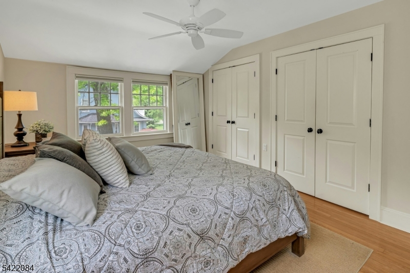 122 Kenilworth Road Mountain Lakes, NJ 07046 - Photo 32 of 45 a bedroom with a bed and a window
