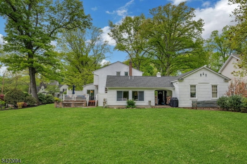 122 Kenilworth Road Mountain Lakes, NJ 07046 - Photo 6 of 45 a front view of house with yard and green space