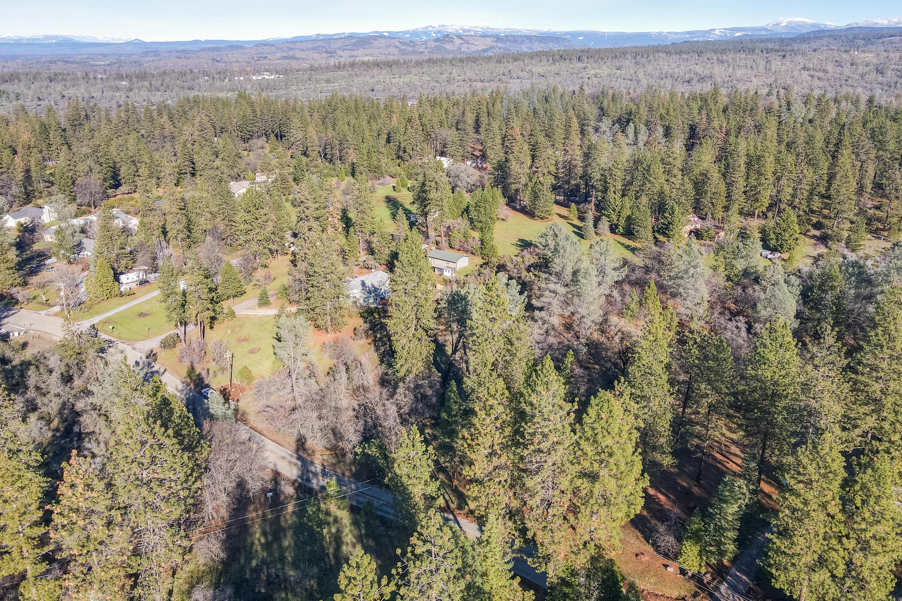 Lot 21 Black Butte Road Shingletown, CA 96088 - Photo 18 of 26 a view of a city with lush green forest