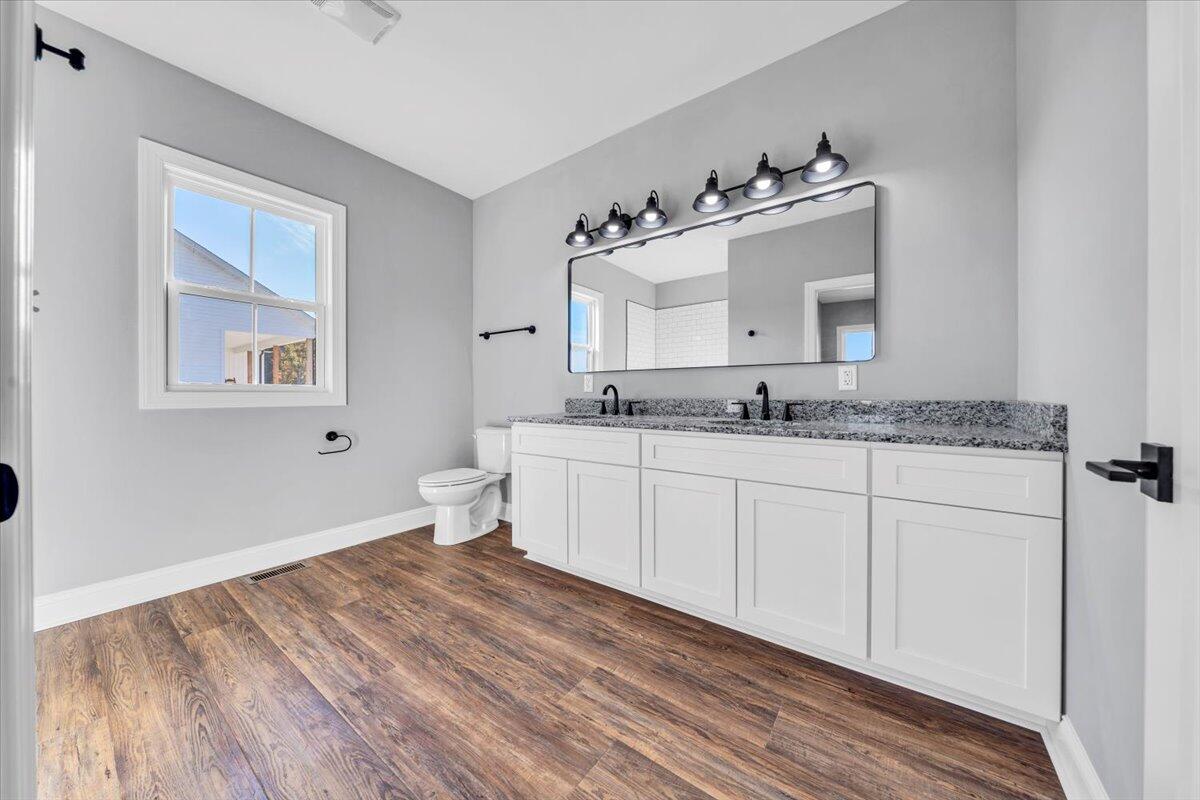 224 Marshall Mill Road Gladys, VA 24554 - Photo 17 of 38 a bathroom with a sink and a mirror