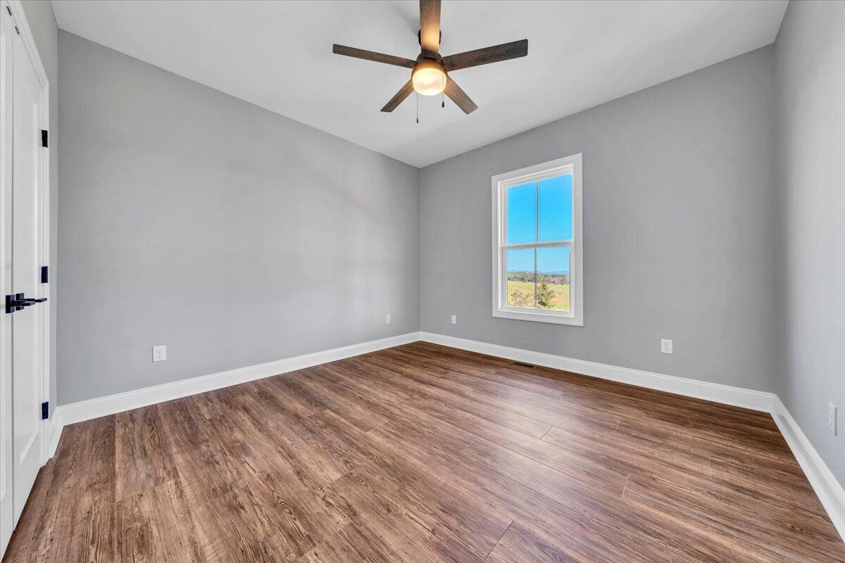 224 Marshall Mill Road Gladys, VA 24554 - Photo 20 of 38 wooden floor in an empty room with a window
