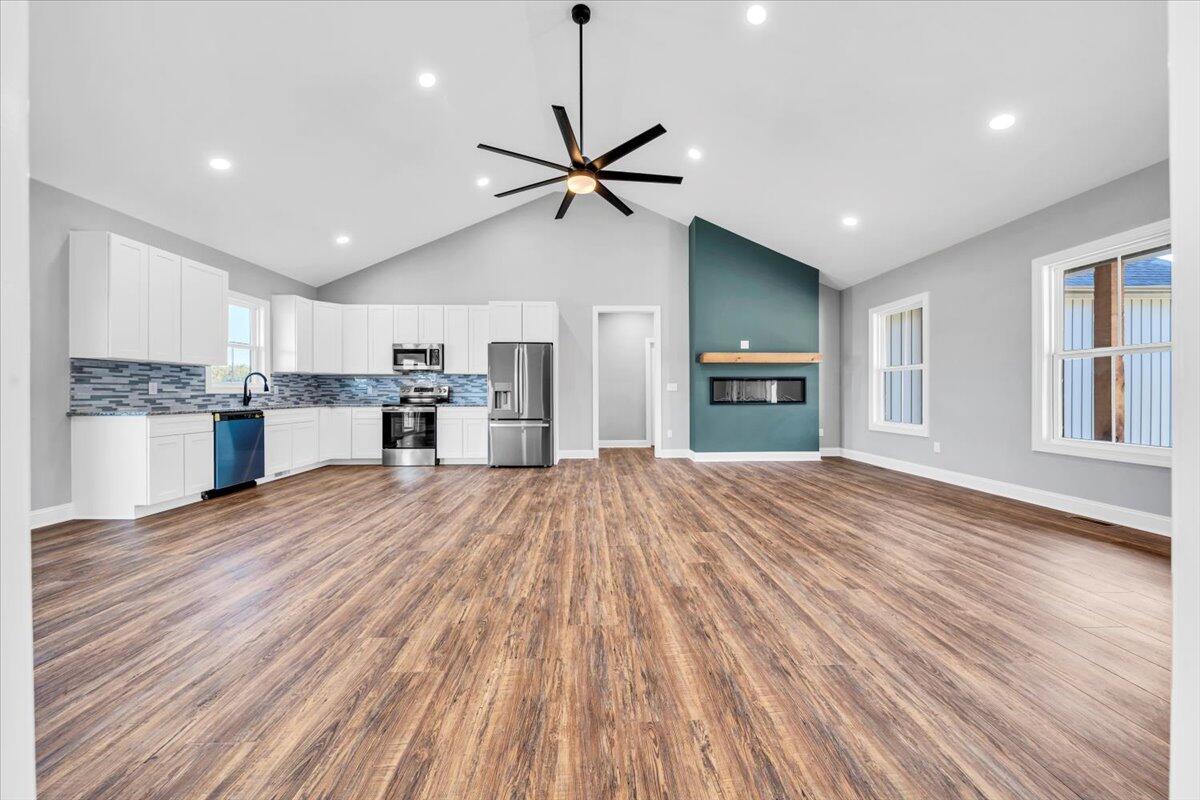 224 Marshall Mill Road Gladys, VA 24554 - Photo 5 of 38 a view of a kitchen with a sink and a refrigerator