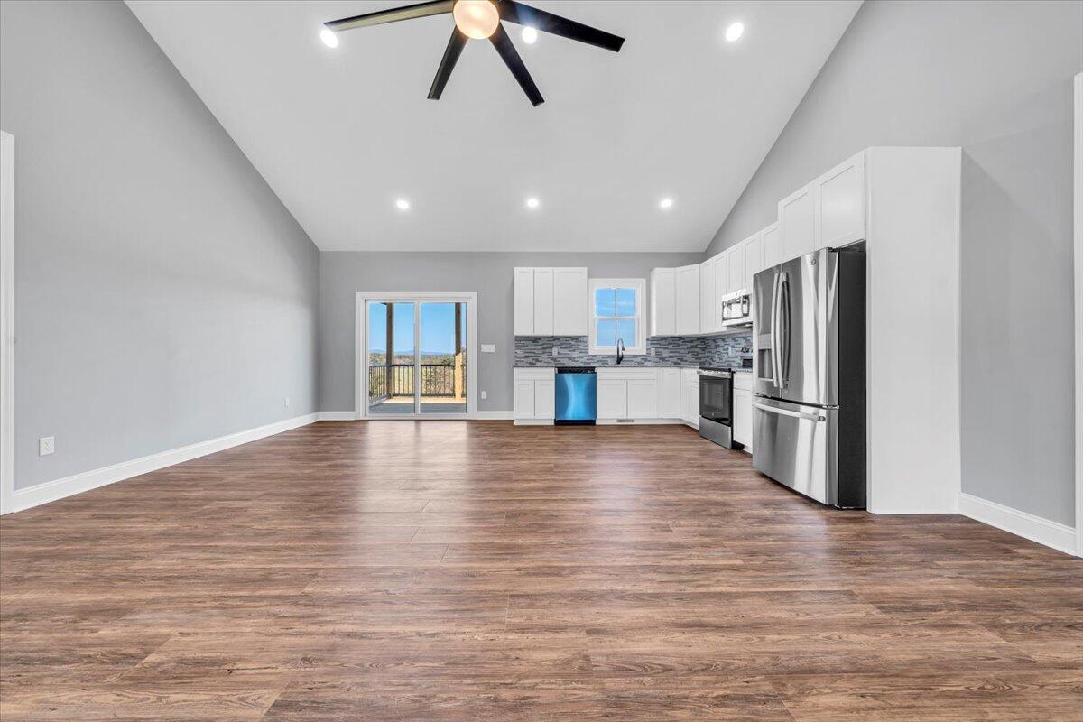 224 Marshall Mill Road Gladys, VA 24554 - Photo 8 of 38 a view of kitchen with refrigerator microwave and stove
