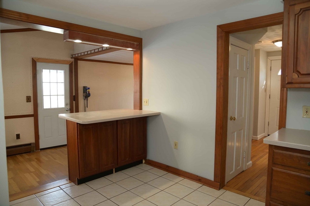 15 Highfield Road Boston, MA 02131 - Photo 16 of 41 a bathroom with a sink a mirror and a vanity