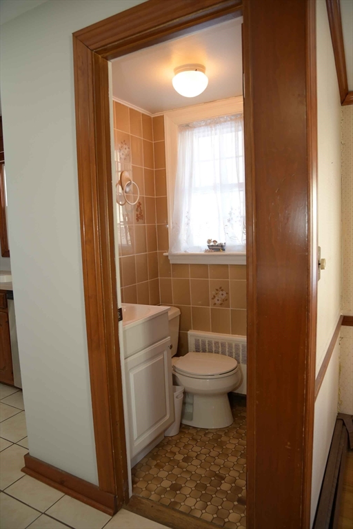 15 Highfield Road Boston, MA 02131 - Photo 22 of 41 a bathroom with a toilet a sink and a shower