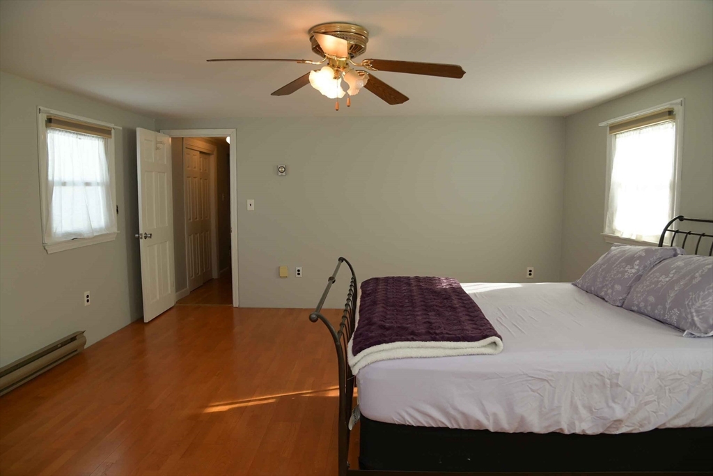 15 Highfield Road Boston, MA 02131 - Photo 25 of 41 a bedroom with a bed and window