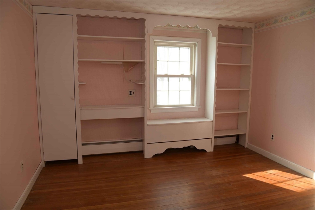 15 Highfield Road Boston, MA 02131 - Photo 34 of 41 a room with walk in closet and window