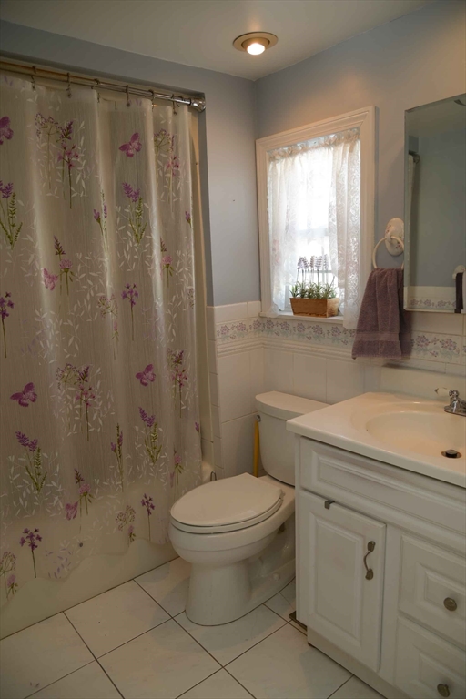 15 Highfield Road Boston, MA 02131 - Photo 38 of 41 a bathroom with a sink a toilet and shower
