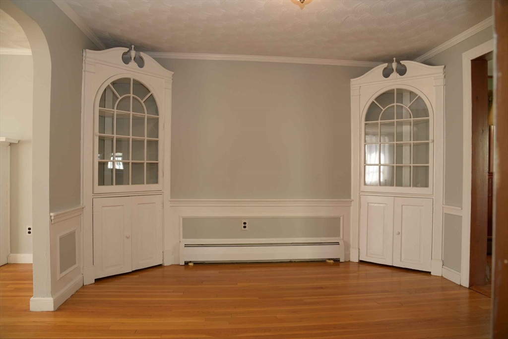 15 Highfield Road Boston, MA 02131 - Photo 6 of 41 a view of a livingroom with wooden floor and a window
