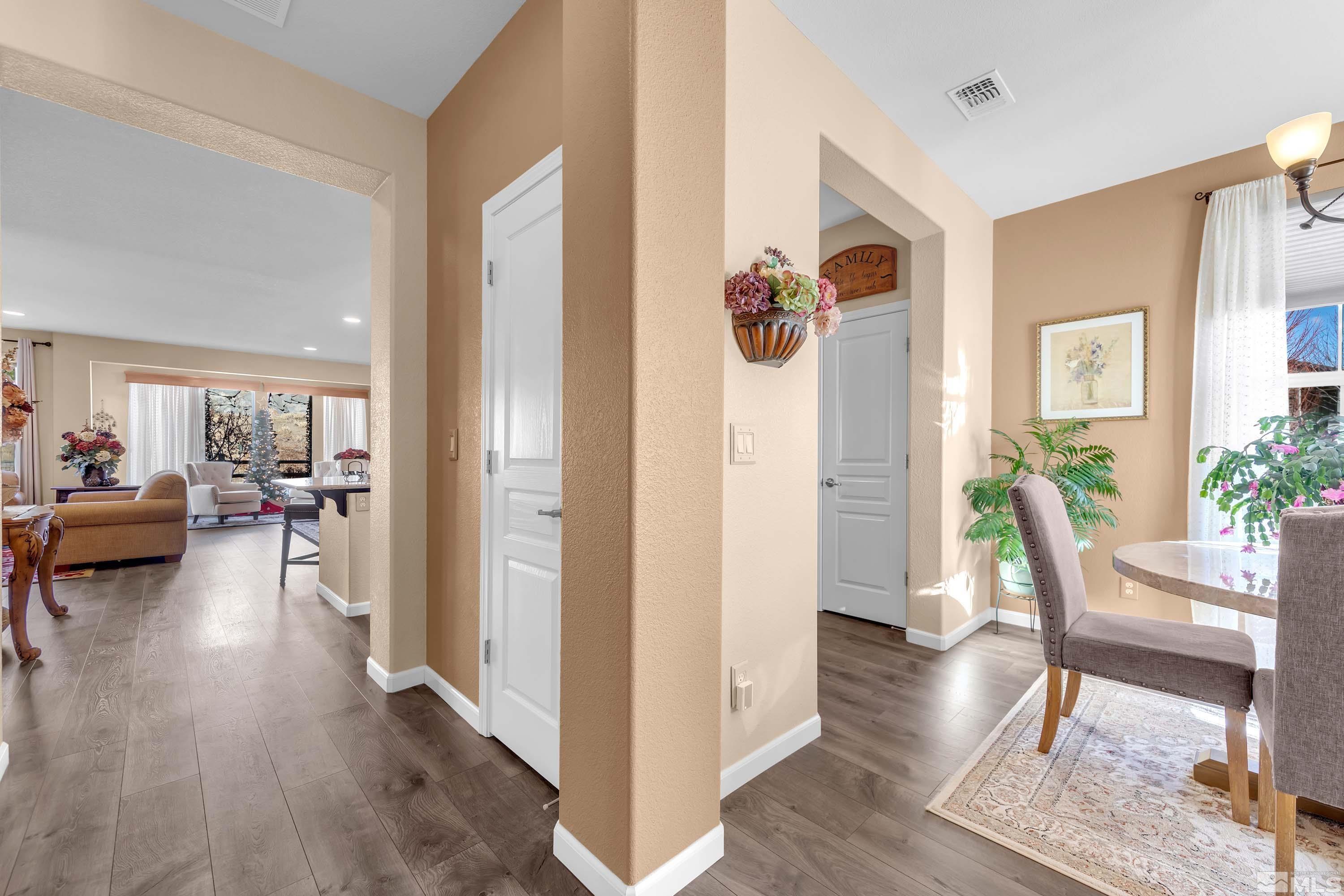 895 Larrimore Trail Reno, NV 89523 - Photo 15 of 39 a living room with furniture and a wooden floor