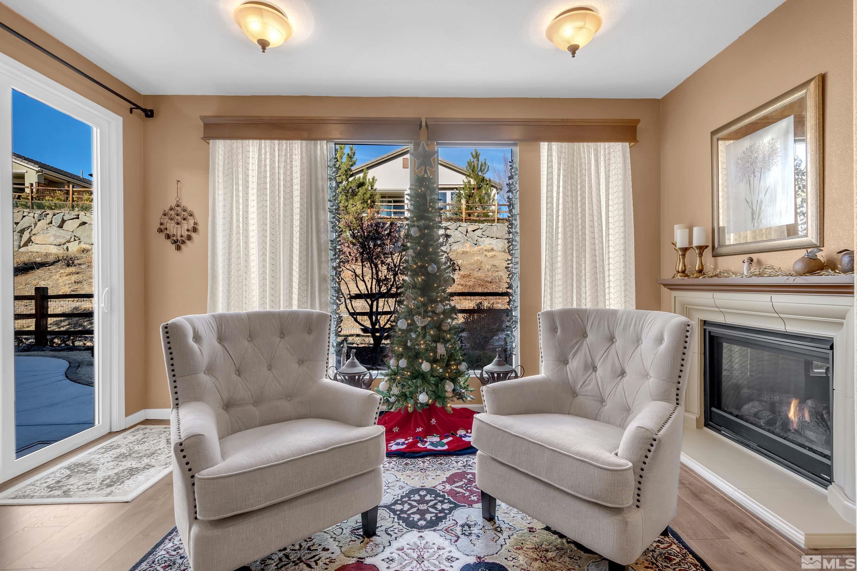 895 Larrimore Trail Reno, NV 89523 - Photo 17 of 39 a living room with furniture and a fireplace