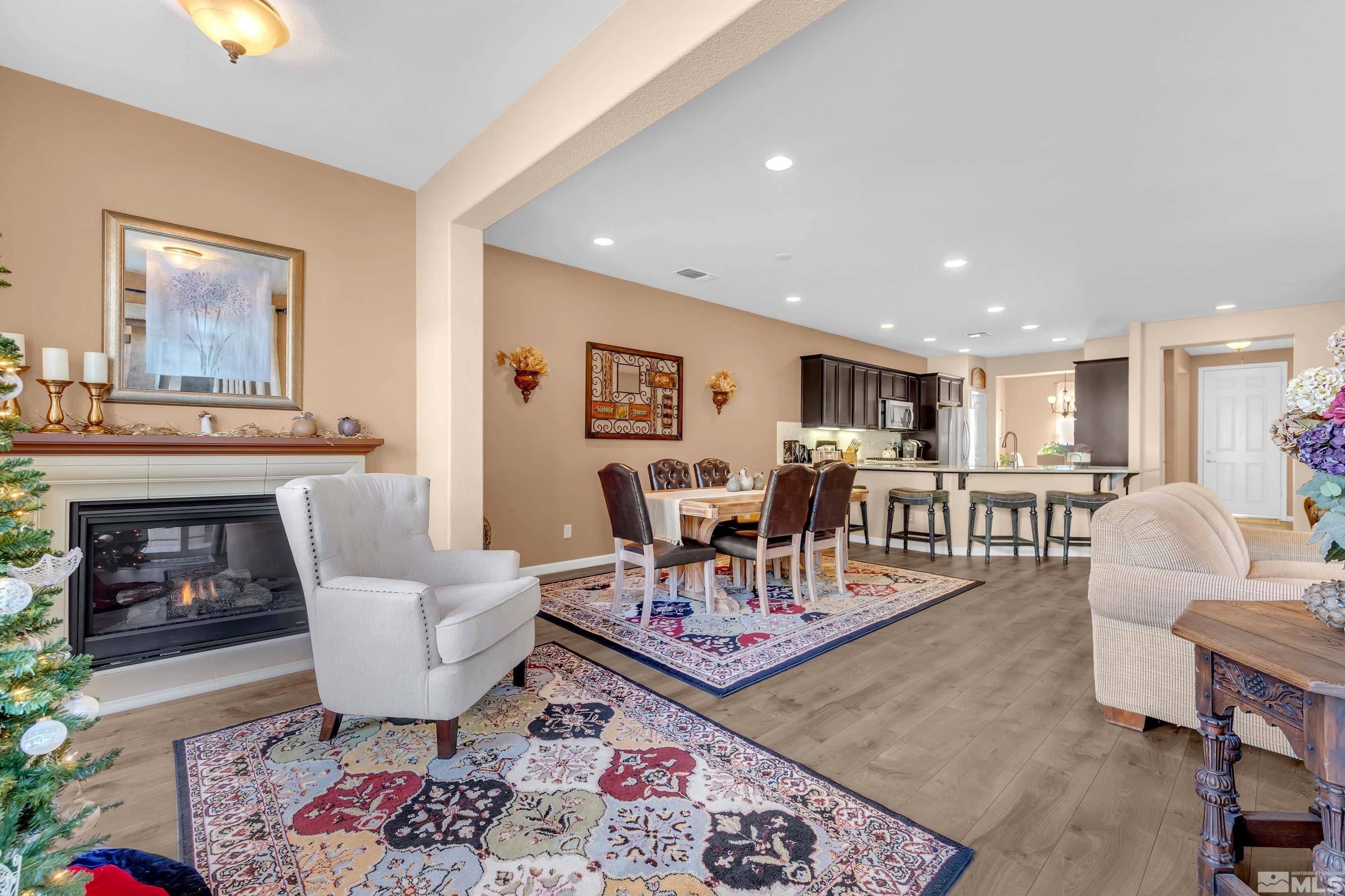 895 Larrimore Trail Reno, NV 89523 - Photo 18 of 39 a living room with furniture and a fireplace