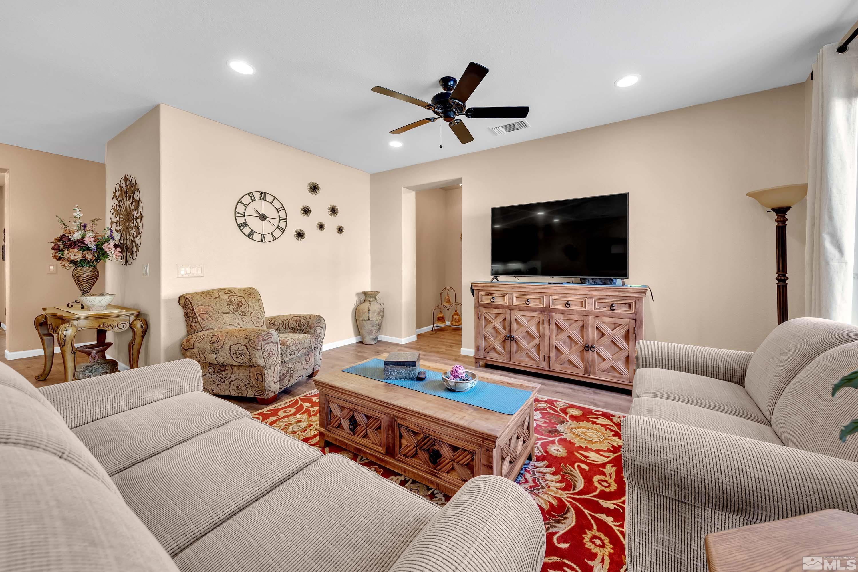 895 Larrimore Trail Reno, NV 89523 - Photo 20 of 39 a living room with furniture and a flat screen tv