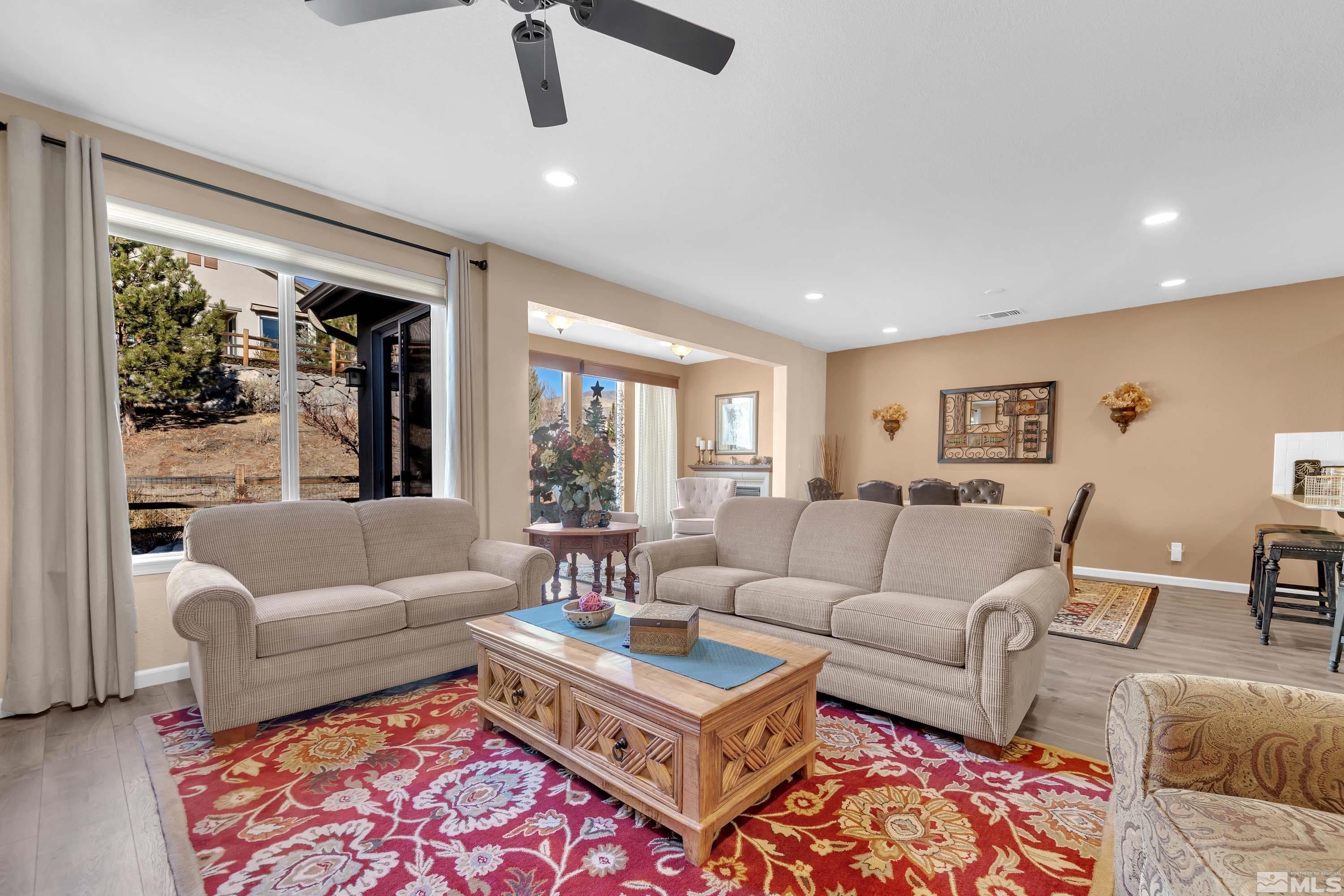 895 Larrimore Trail Reno, NV 89523 - Photo 22 of 39 a living room with furniture and a large window