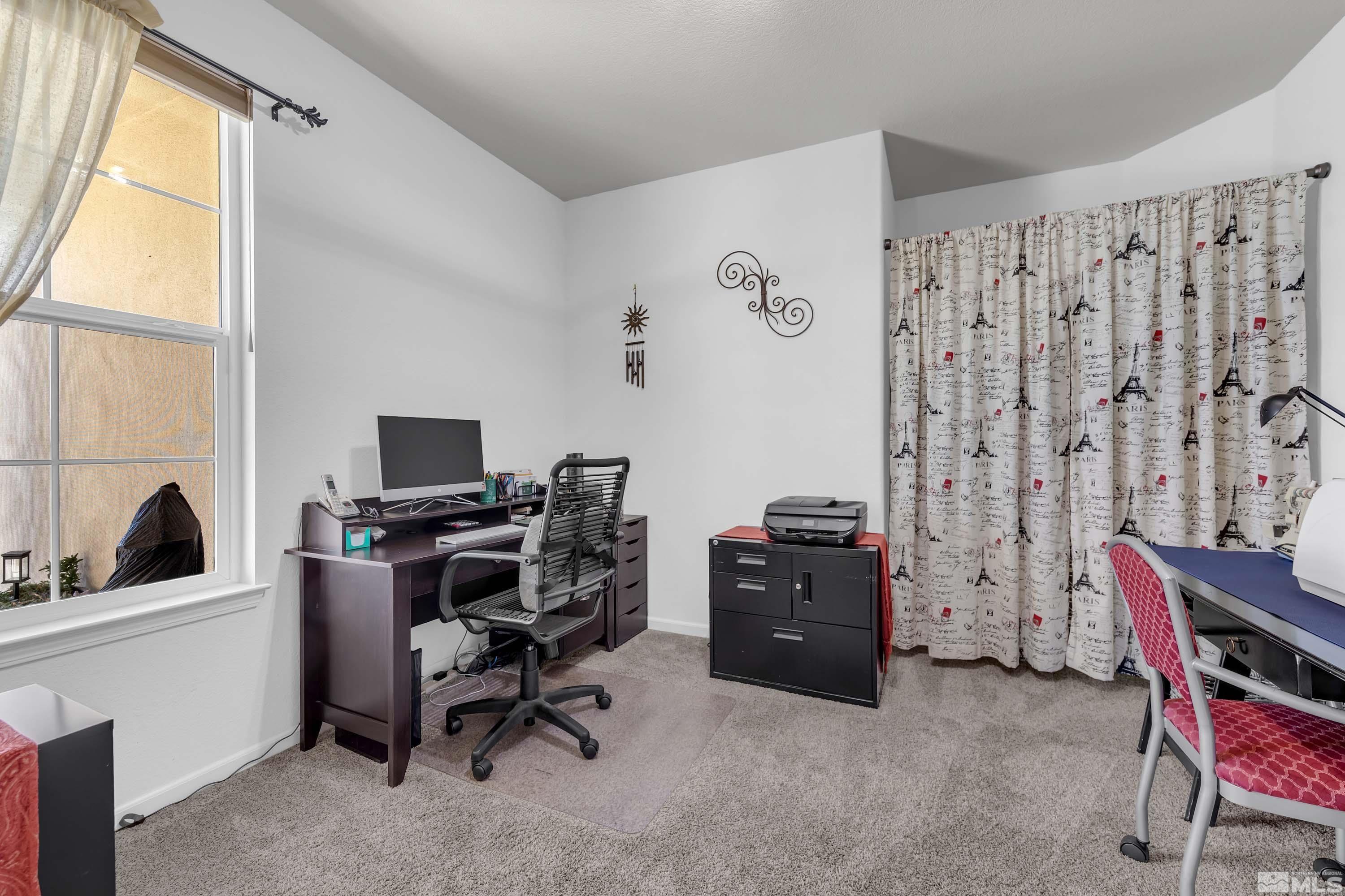 895 Larrimore Trail Reno, NV 89523 - Photo 24 of 39 a view of a workspace with furniture and a window