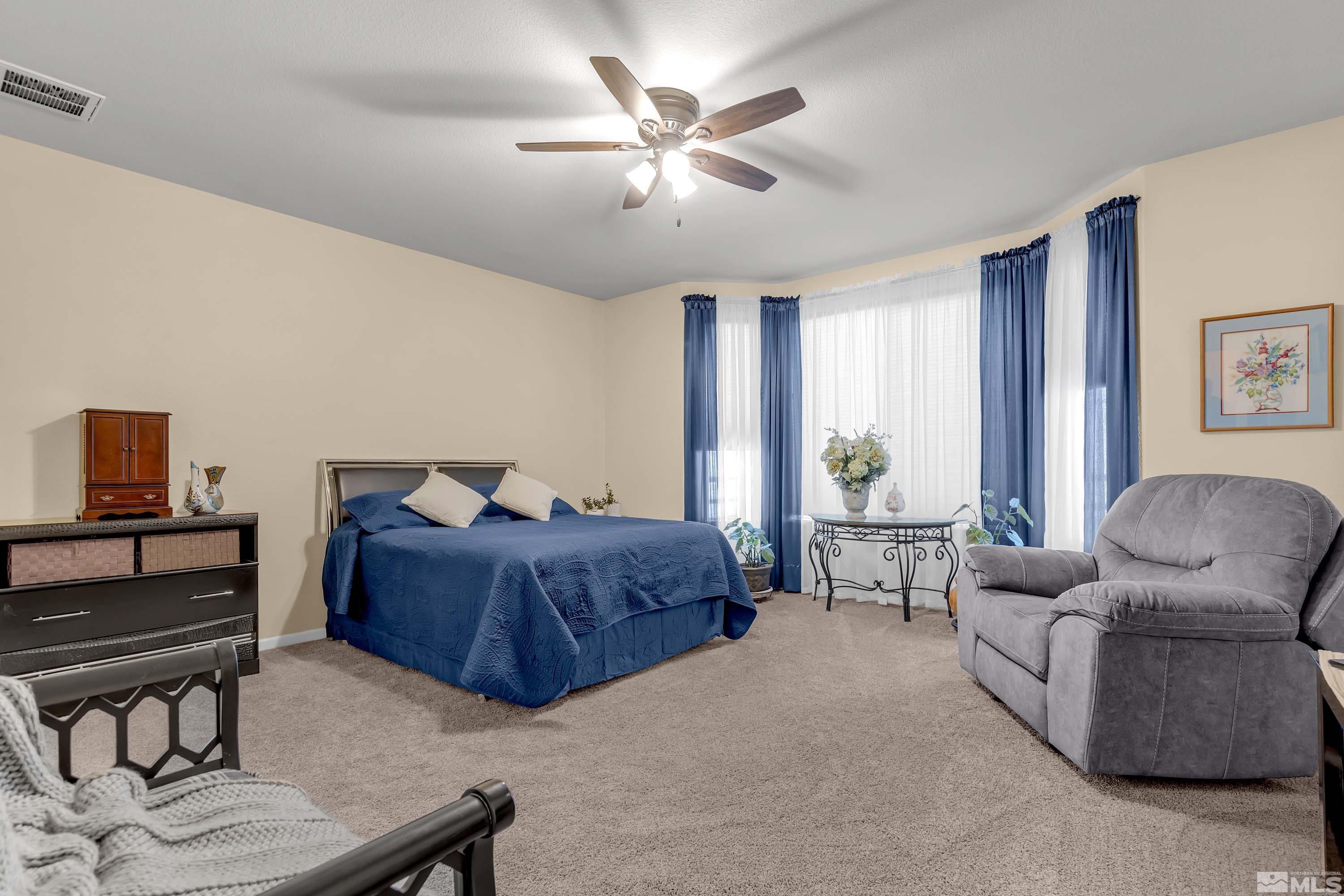 895 Larrimore Trail Reno, NV 89523 - Photo 25 of 39 a living room with furniture and a window