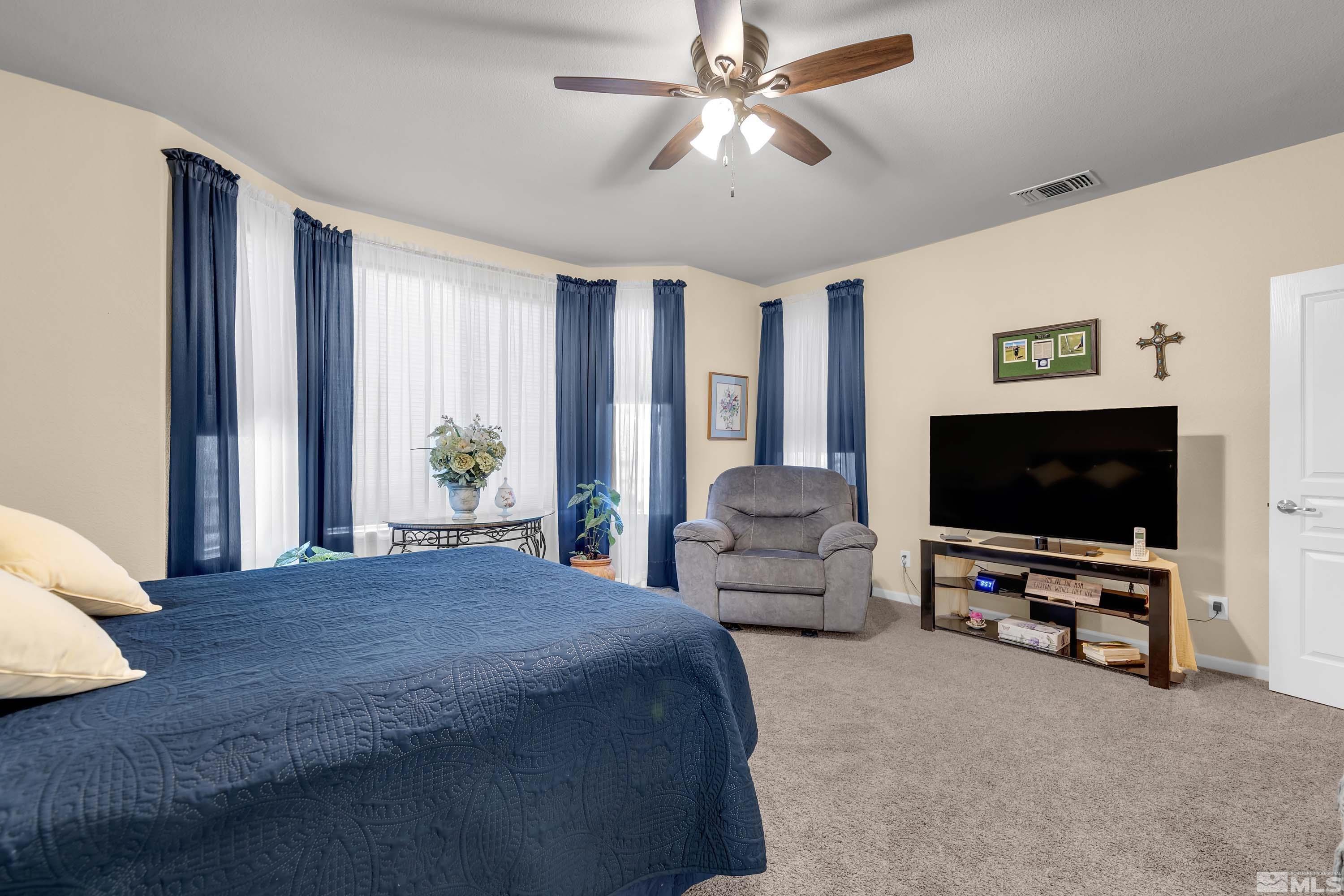 895 Larrimore Trail Reno, NV 89523 - Photo 26 of 39 a view of a livingroom with furniture and a flat screen tv