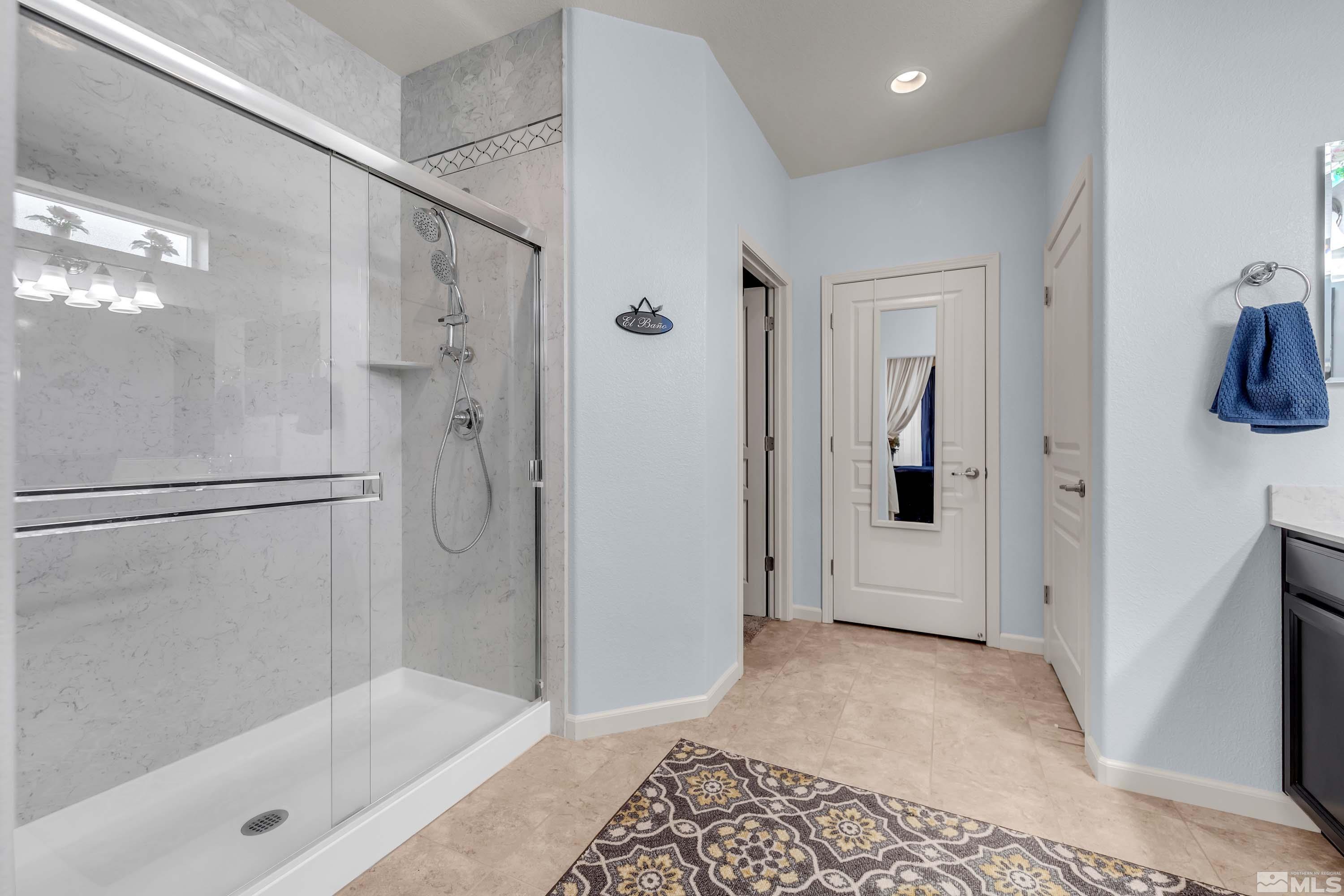 895 Larrimore Trail Reno, NV 89523 - Photo 29 of 39 a bathroom with a bathtub and a shower