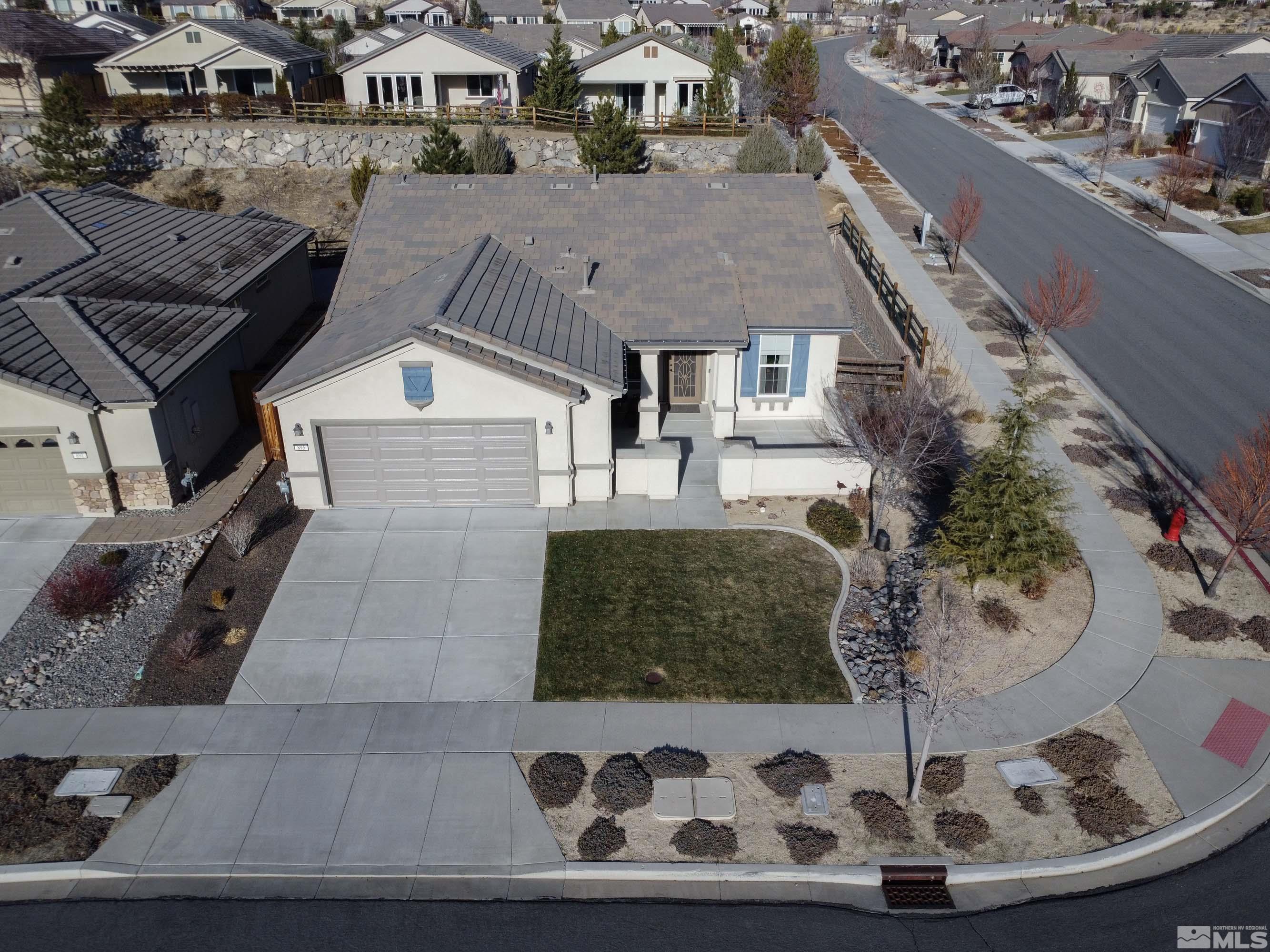 895 Larrimore Trail Reno, NV 89523 - Photo 3 of 39 a view of a house with a backyard