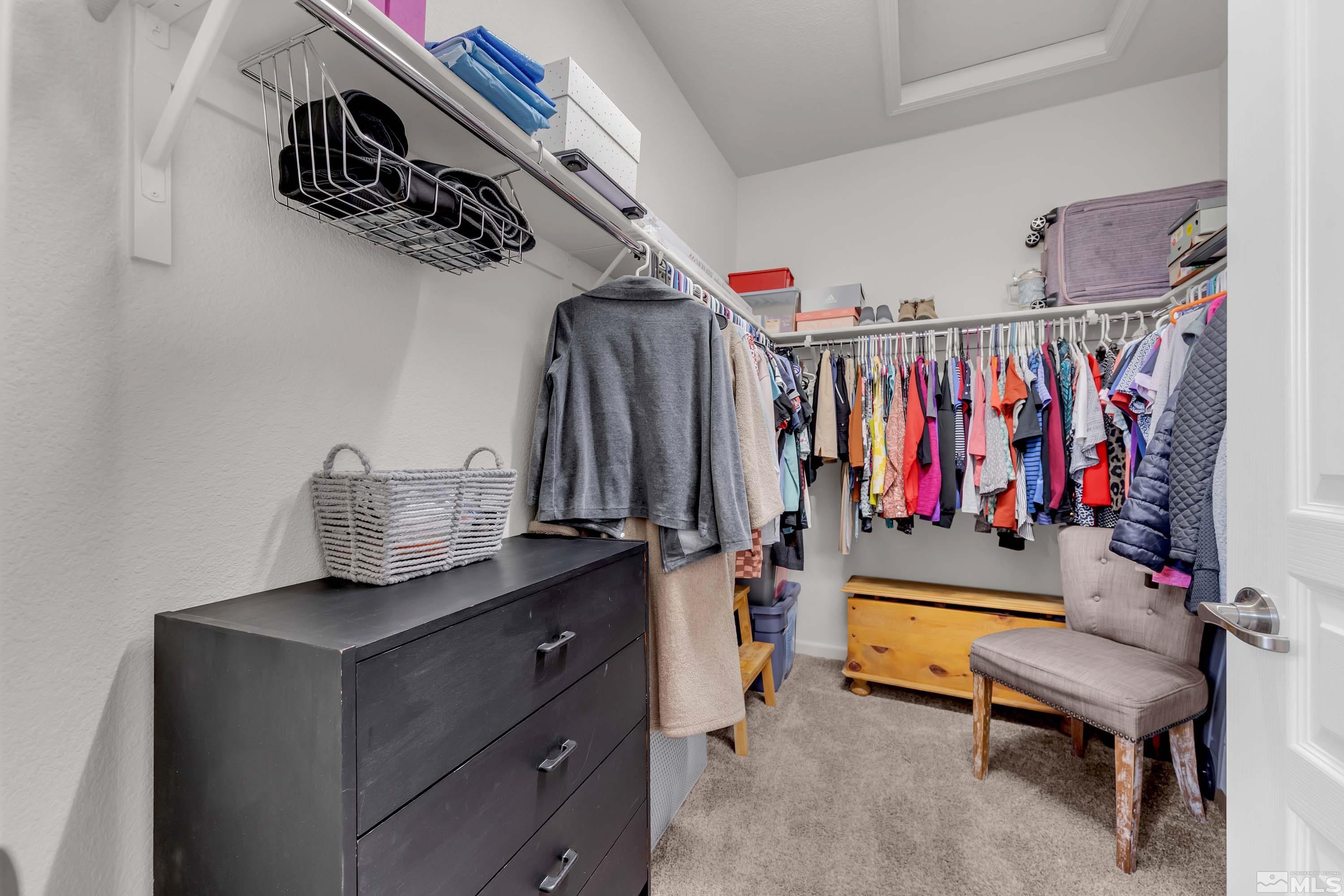 895 Larrimore Trail Reno, NV 89523 - Photo 31 of 39 a view of walk in closet with clothes and shoes