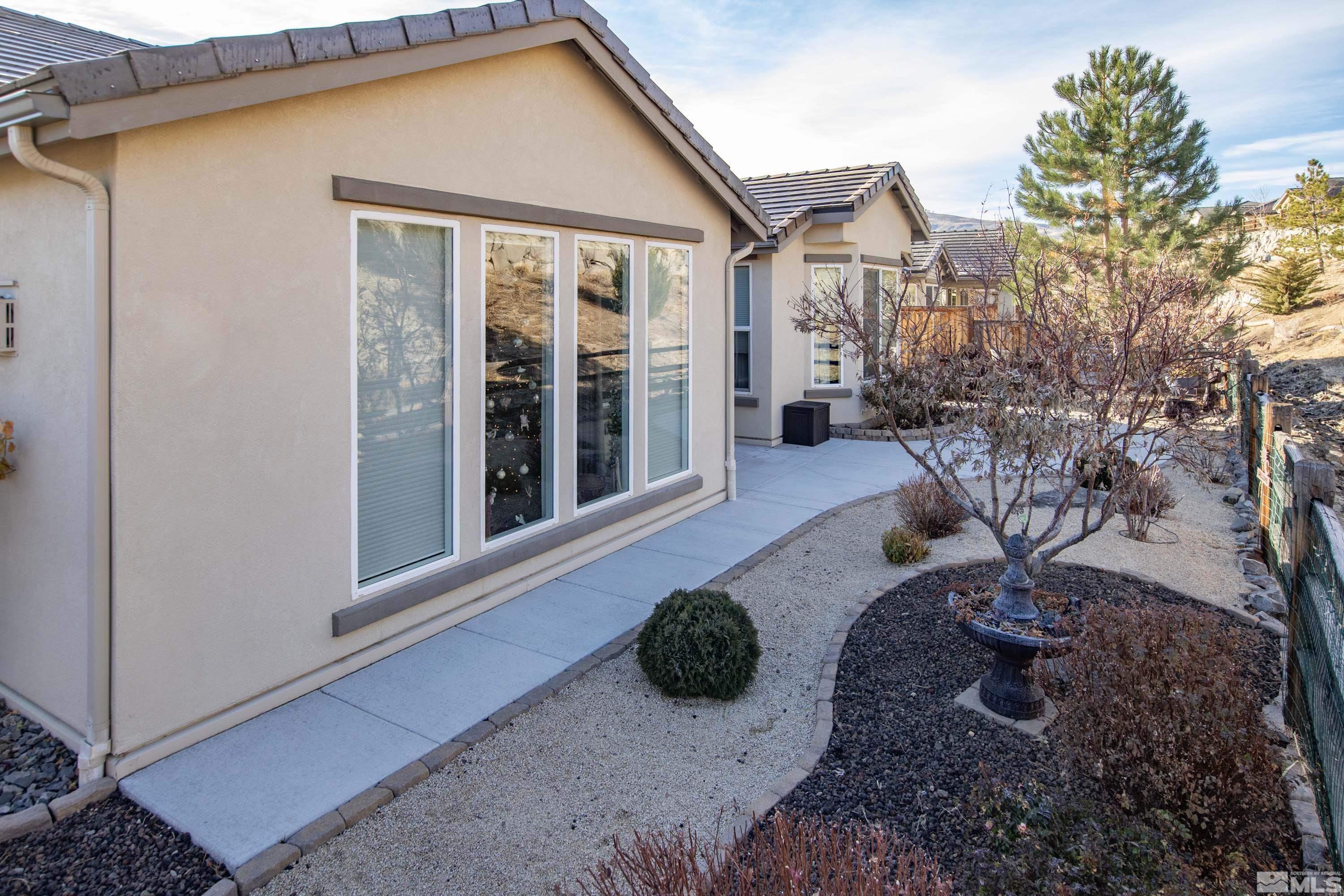 895 Larrimore Trail Reno, NV 89523 - Photo 39 of 39 a view of a house with backyard and porch