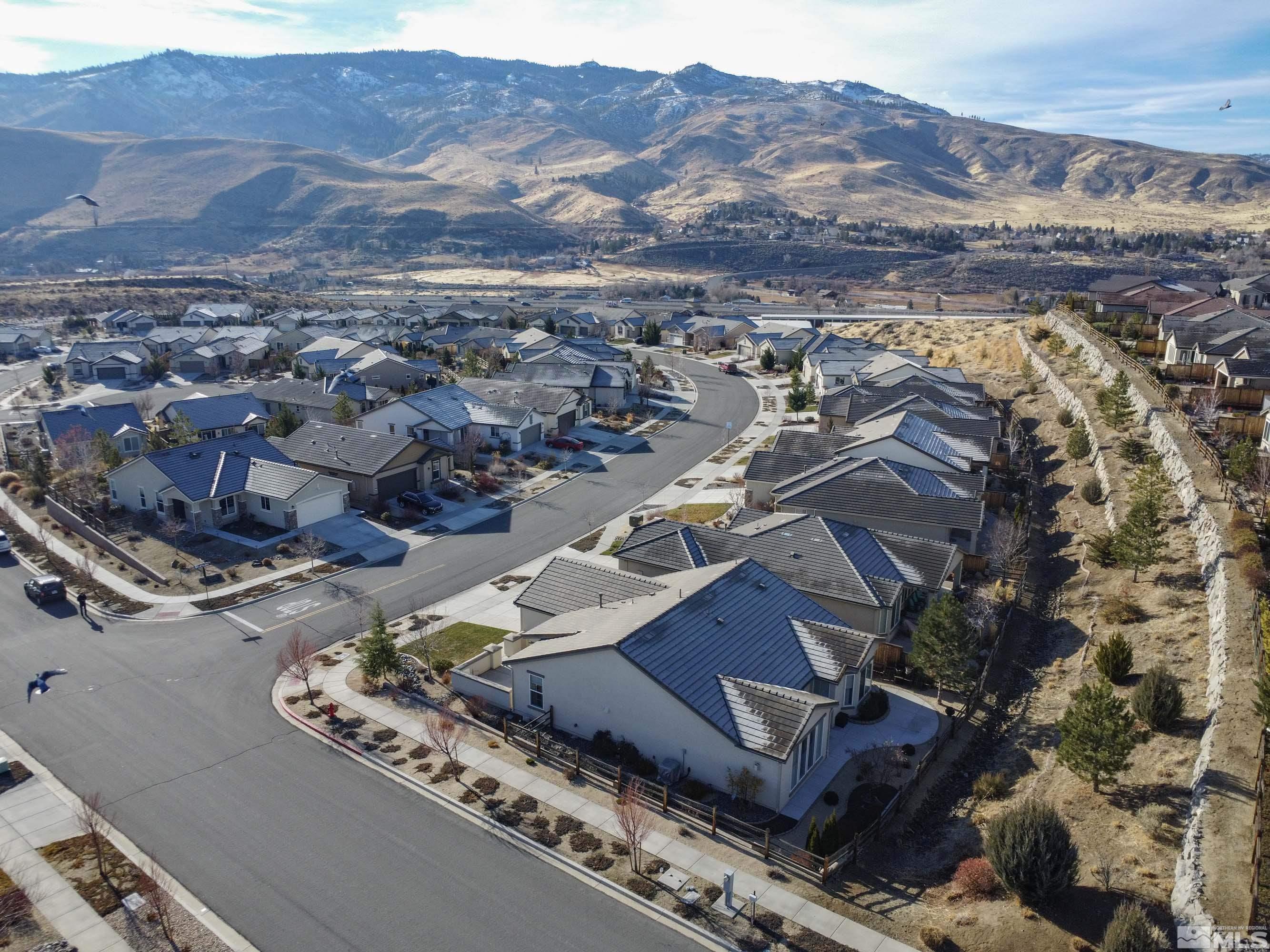 895 Larrimore Trail Reno, NV 89523 - Photo 4 of 39 an aerial view of residential houses with outdoor space
