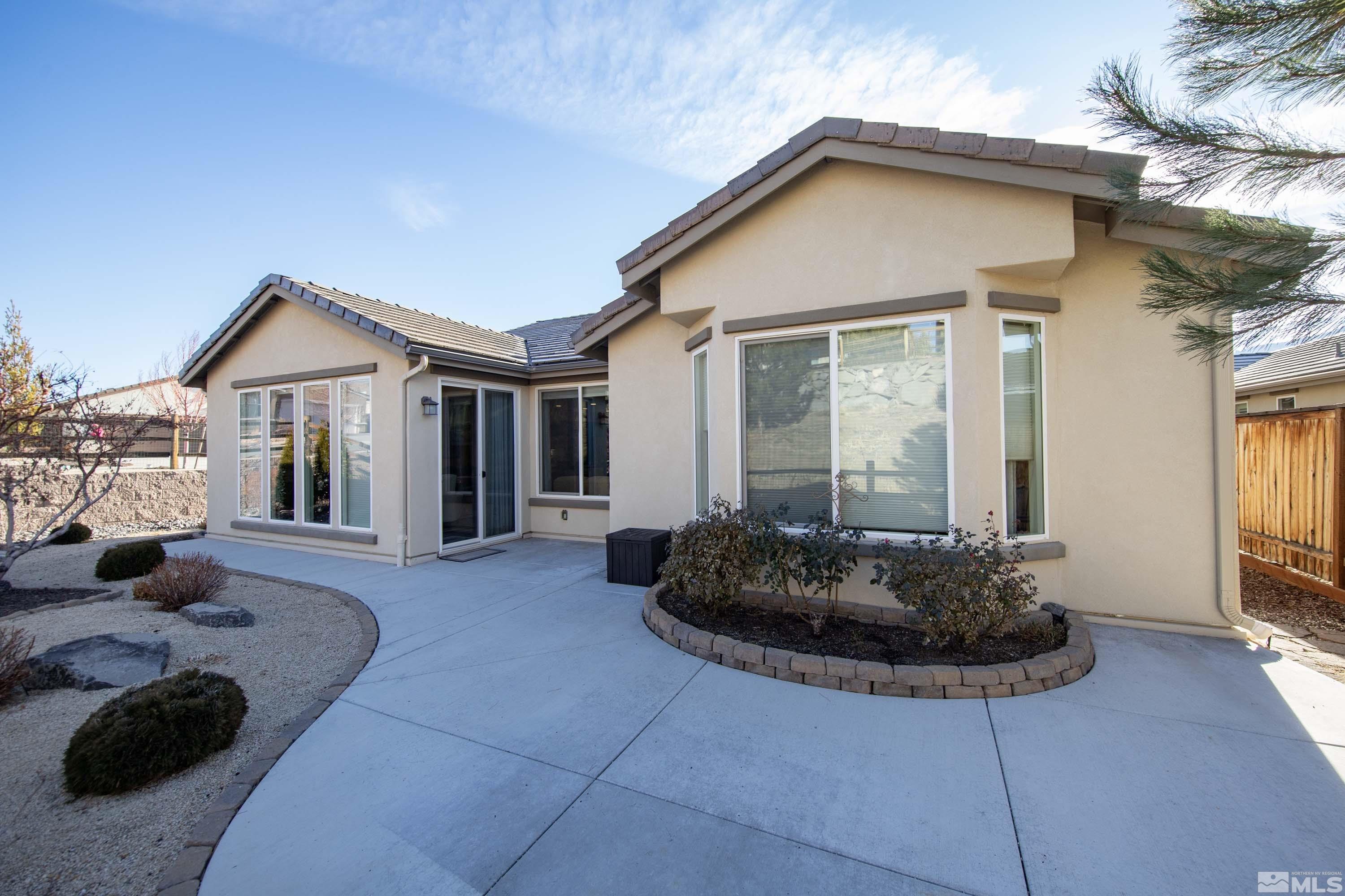 895 Larrimore Trail Reno, NV 89523 - Photo 6 of 39 a view of a house with backyard and sitting area