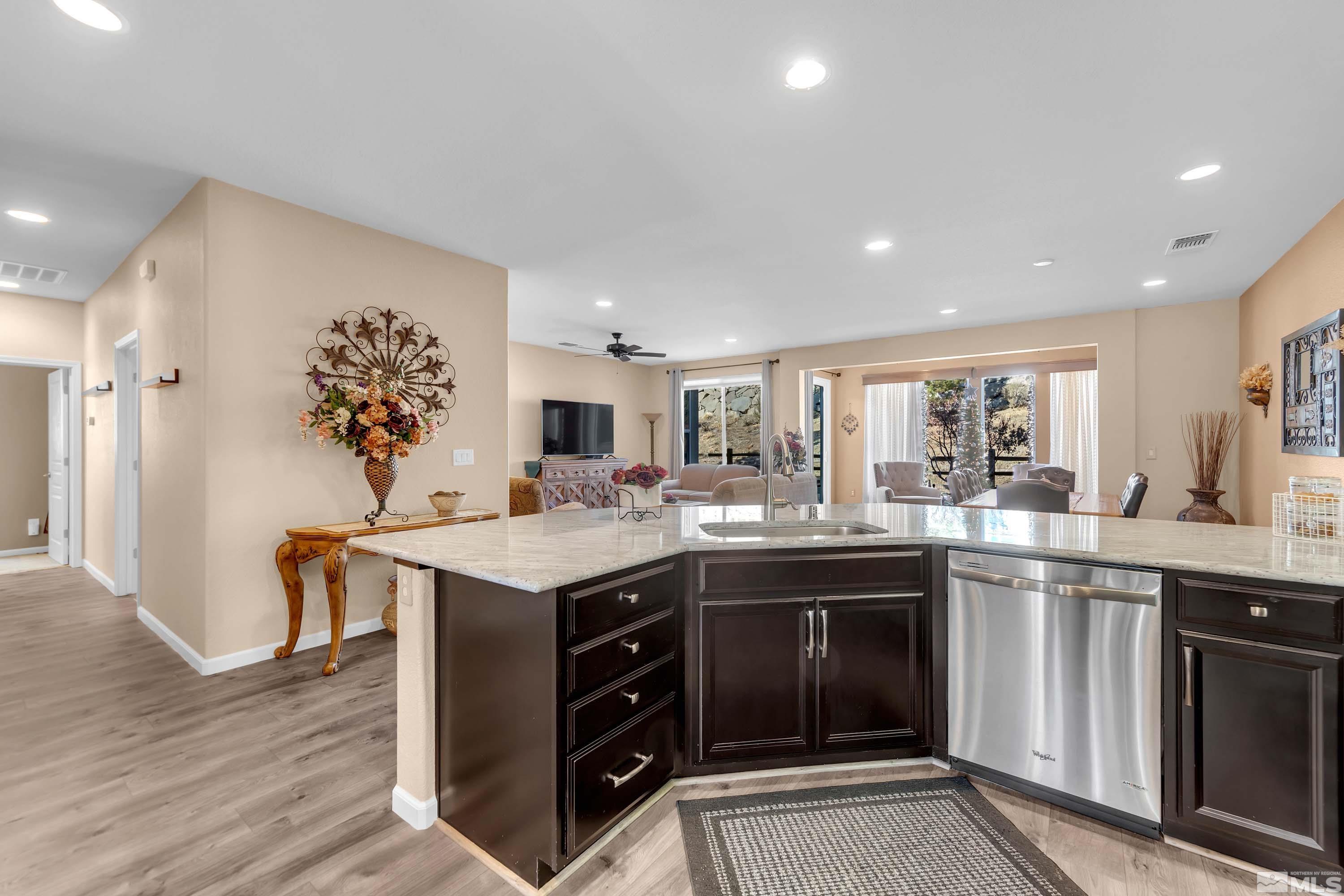 895 Larrimore Trail Reno, NV 89523 - Photo 9 of 39 a kitchen with a sink and cabinets